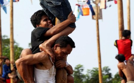 Licin Tapi Mengasyikkan: Rahasia di Balik Pesona Panjat Pinang